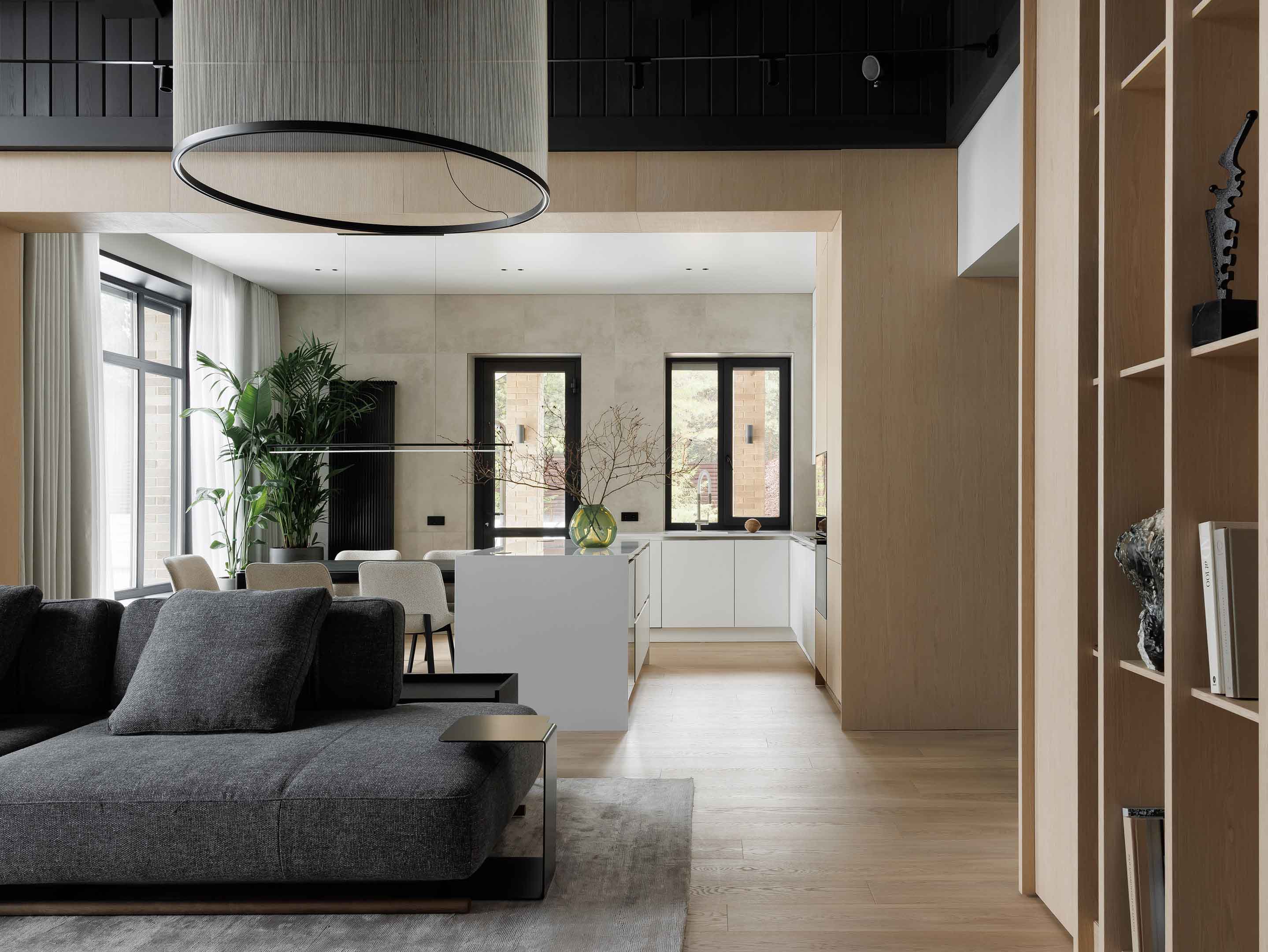 Цвет шпона фасадов из кухни плавно перетекает в гостиную - проекты Setus Design